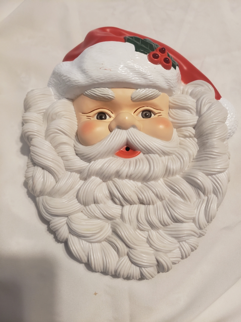 1995 plastic Telco Creations talking and singing Santa Claus wall decoration.